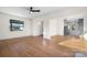Open concept living and kitchen area with hardwood floors and lots of natural light at 49 8Th Se St, Hickory, NC 28602