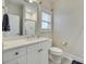 Bright bathroom featuring vanity, large mirror, and ample storage at 520 Crawfish Dr, Fort Mill, SC 29708