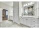 Bright and airy bathroom with tiled floors, dual vanities, and neutral paint at 520 Crawfish Dr, Fort Mill, SC 29708