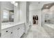 Bright bathroom with double vanity, walk-in shower, and separate soaking tub at 520 Crawfish Dr, Fort Mill, SC 29708