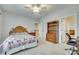 Cozy bedroom with a quilt bedspread and staircase at 520 Crawfish Dr, Fort Mill, SC 29708