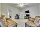 Well-lit bonus room with comfortable seating and a dedicated workspace at 520 Crawfish Dr, Fort Mill, SC 29708