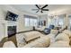 Inviting living room with fireplace, large windows, and comfortable seating, perfect for relaxation at 520 Crawfish Dr, Fort Mill, SC 29708