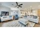 Spacious open-concept living area with hardwood floors and seamless flow into the kitchen at 520 Crawfish Dr, Fort Mill, SC 29708