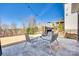 Backyard patio area featuring comfortable seating and an outdoor fireplace with a picturesque view at 520 Crawfish Dr, Fort Mill, SC 29708