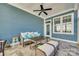 Relaxing covered porch with a cushioned sofa, table, and bench, perfect for outdoor lounging at 520 Crawfish Dr, Fort Mill, SC 29708