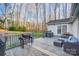 Backyard deck with a grill and seating area for entertaining at 6017 Caroline Dr, Matthews, NC 28104