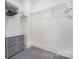 Well-organized closet space features shelves, hanging racks, and storage drawers at 7019 Lenton Rd, Charlotte, NC 28215