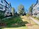 Inviting courtyard with lush landscaping and walkways at 707 Hoke Ln, Davidson, NC 28036