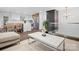 Bright interior with modern finishes, showcasing an open layout with a stylish living area and adjacent kitchen at 7314 Entwhistle Ct, Charlotte, NC 28226