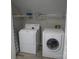 Laundry area with a washer and dryer hookup, tile flooring, and shelving at 8188 Normandy Rd, Denver, NC 28037