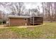 Brick house with screened porch and deck at 833 E Chestnut St, Stanley, NC 28164