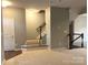 Bright and airy living room with staircase and hardwood floors visible at 11724 Blessington Rd, Huntersville, NC 28978