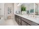 Bathroom featuring a double sink vanity with quartz countertop and stylish decor at 119 Winterberry St, Mooresville, NC 28117