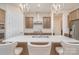 Spacious kitchen island with a sink and seating, perfect for casual dining and entertaining at 119 Winterberry St, Mooresville, NC 28117