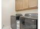 Laundry room showcasing modern washer and dryer units at 119 Winterberry St, Mooresville, NC 28117