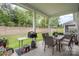 Enjoy outdoor living on this screened-in patio, with ample space for dining and relaxation at 119 Winterberry St, Mooresville, NC 28117