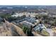 Aerial view of a neighborhood with townhomes and a community pool at 1475 Cypress Loop # 29, Newton, NC 28658