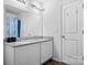 Bathroom with a granite countertop and a large mirror at 1475 Cypress Loop # 29, Newton, NC 28658
