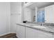 Bathroom with double sink vanity, granite countertop and a large mirror at 1475 Cypress Loop # 29, Newton, NC 28658