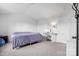 Neutral bedroom featuring a bed, a desk and white walls with white doors and trim at 1475 Cypress Loop # 29, Newton, NC 28658