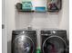 A modern laundry room featuring black Samsung washer and dryer at 1475 Cypress Loop # 29, Newton, NC 28658