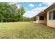 Spacious backyard with a covered patio perfect for relaxing and entertaining at 148 Castle Dr, Mooresville, NC 28117