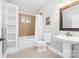 Bathroom featuring a shower-tub combo with white fixtures at 148 Castle Dr, Mooresville, NC 28117