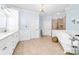 Bathroom showcasing a freestanding soaking tub, a tiled shower, double vanity, and classic fixtures at 148 Castle Dr, Mooresville, NC 28117