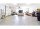 Spacious garage interior with ample storage and room for multiple vehicles or equipment at 148 Castle Dr, Mooresville, NC 28117