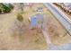 Aerial view showcasing the house, driveway, and large lot at 2004 Grandhaven Dr, Concord, NC 28027