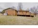 Brick ranch home with deck and spacious backyard at 2004 Grandhaven Dr, Concord, NC 28027