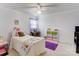 Well-lit bedroom with a twin bed and colorful decor at 2004 Grandhaven Dr, Concord, NC 28027