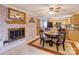 Bright kitchen features a brick fireplace, breakfast nook, and ample cabinetry at 2004 Grandhaven Dr, Concord, NC 28027