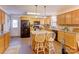Kitchen with island, stainless steel appliances, and wood cabinets at 2004 Grandhaven Dr, Concord, NC 28027