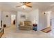 Spacious living room boasts a cozy seating area and views into the hallway at 2004 Grandhaven Dr, Concord, NC 28027