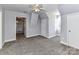 Carpeted bedroom featuring a ceiling fan, dormer window, and white trim at 2050 Tite Rd, Stanfield, NC 28163