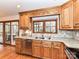 Well-lit kitchen with stainless steel appliances, granite countertops and beautiful cabinetry at 2050 Tite Rd, Stanfield, NC 28163