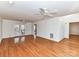 Bright and airy living room featuring hardwood floors and sliding glass doors to an outdoor patio at 2050 Tite Rd, Stanfield, NC 28163