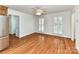 Spacious living room features a ceiling fan and large windows for lots of natural light at 2050 Tite Rd, Stanfield, NC 28163
