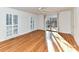 Spacious bedroom featuring hardwood floors, natural light and access to outdoor deck at 2050 Tite Rd, Stanfield, NC 28163