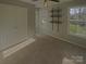 Bright bedroom with neutral walls, carpet flooring, and double door closet at 257 Doughton Ln, Charlotte, NC 28217