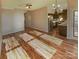 Bright dining area with hardwood floors and view to backyard at 257 Doughton Ln, Charlotte, NC 28217