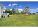 Large backyard with green grass, shed, and deck at 2880 Harmony Rd, Rock Hill, SC 29730