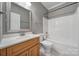 Bathroom featuring a vanity with a sink, a toilet, and a bathtub with shower at 2880 Harmony Rd, Rock Hill, SC 29730