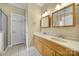 Bathroom boasts dual sinks, vanity, and a tiled floor at 2880 Harmony Rd, Rock Hill, SC 29730