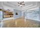 Open-concept living area showcasing wood floors and seamless flow into the kitchen and dining spaces at 2880 Harmony Rd, Rock Hill, SC 29730