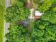 Overhead view of property featuring house, detached garage and mature trees at 2988 Great Falls Hwy, Lancaster, SC 29720