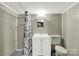 Basement bathroom with shower and white vanity at 2988 Great Falls Hwy, Lancaster, SC 29720