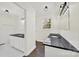Modern bathroom with double vanity and dark countertop at 2988 Great Falls Hwy, Lancaster, SC 29720